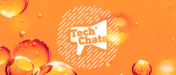 Tablets as background with the words 'tech chat'